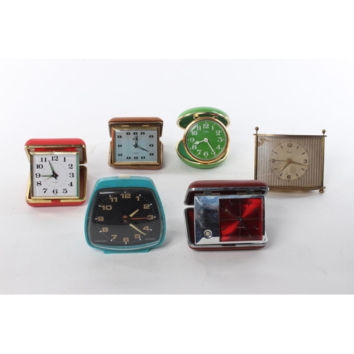 109 - An assortment of retro travelling clocks.