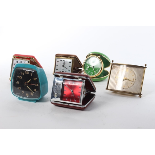 109 - An assortment of retro travelling clocks.