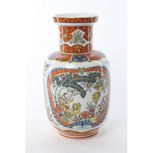 116 - An antique Oriental style vase, 'Eken'. Approx  25cm.