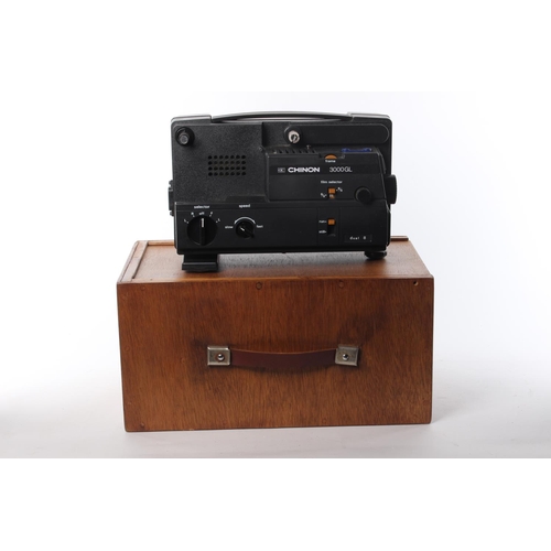 119 - A Chinon 3000GL projector and wooden case.