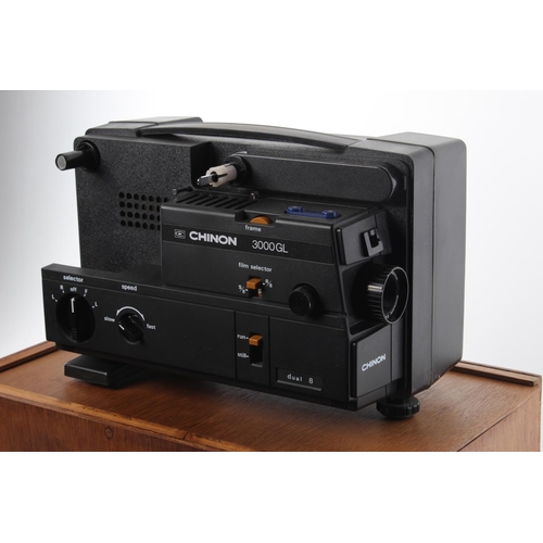 119 - A Chinon 3000GL projector and wooden case.