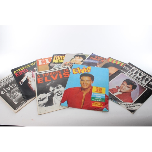 120 - An assortment of Elvis magazines and posters.