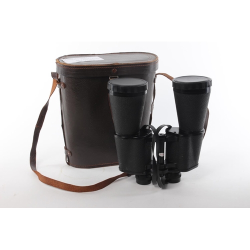 123 - A set of vintage field glasses binoculars with original leather bound case.