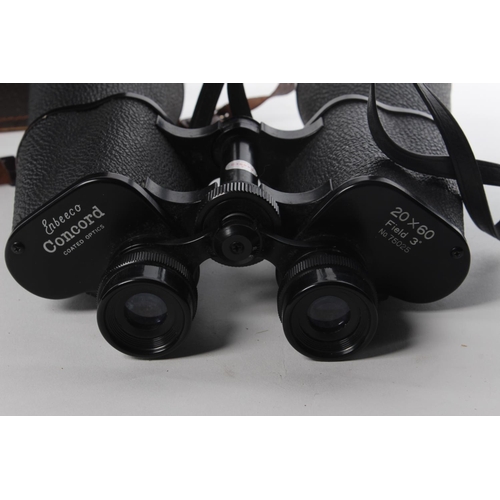 123 - A set of vintage field glasses binoculars with original leather bound case.