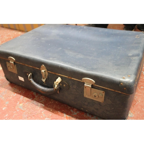 131 - A vintage suitcase.