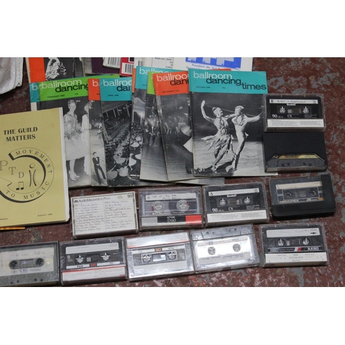 134 - A large collection of ball room dancing themed cassettes and magazines.