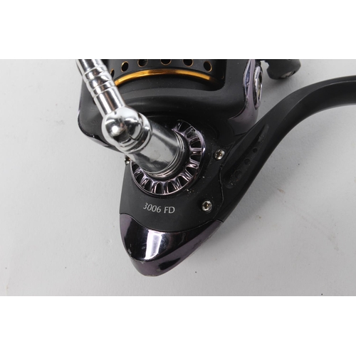 143 - A Black Eagle 3006 FD Mikado fishing reel.