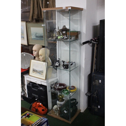 152 - A glass display cabinet.