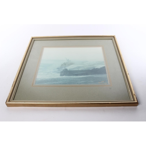 155 - A framed print of the Portrush lifeboat, signed by the photographer Ian Watson. Approx  29x24cm.