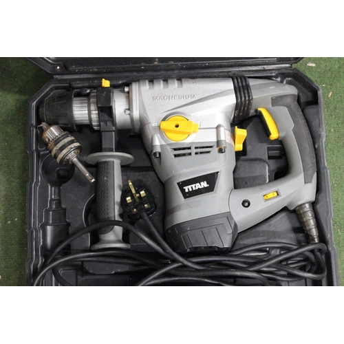 160 - A Titan nail gun with carry case.