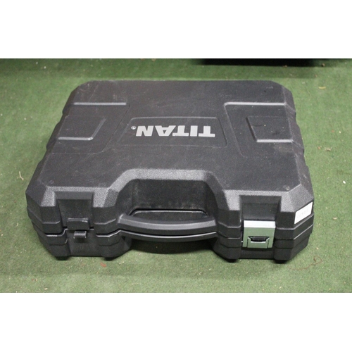 160 - A Titan nail gun with carry case.