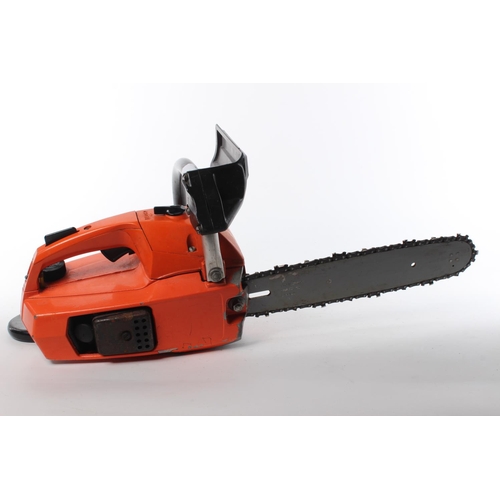 161 - A petrol chainsaw.