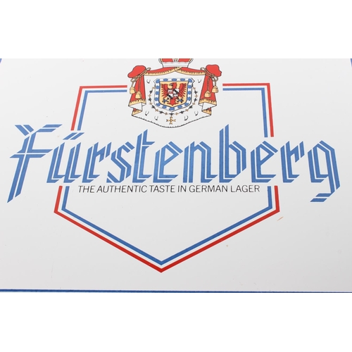 187 - A vintage enamel pub sign for Furstenberg German Lager. 32x40cm