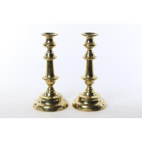 188 - A vintage pair of brass candlesticks.