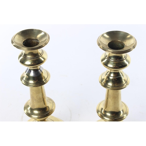 188 - A vintage pair of brass candlesticks.