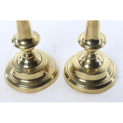 188 - A vintage pair of brass candlesticks.