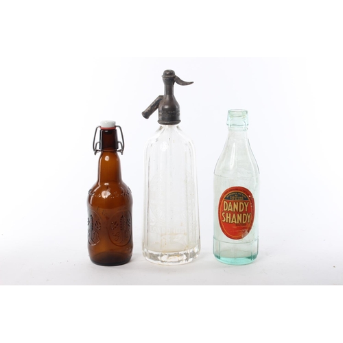 189 - An antique soda syphon, 'The Madden - LondonDerry', and two other bottles.