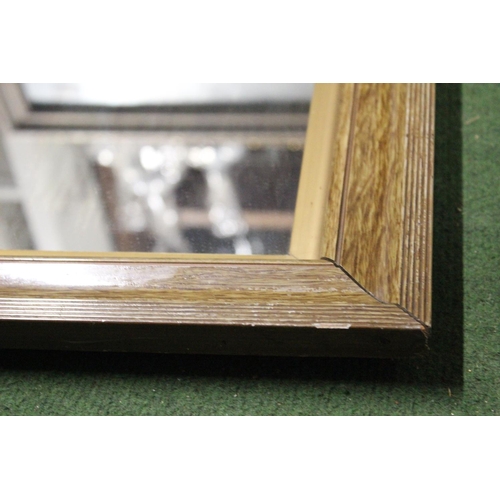 193 - A modern wood framed mirror.