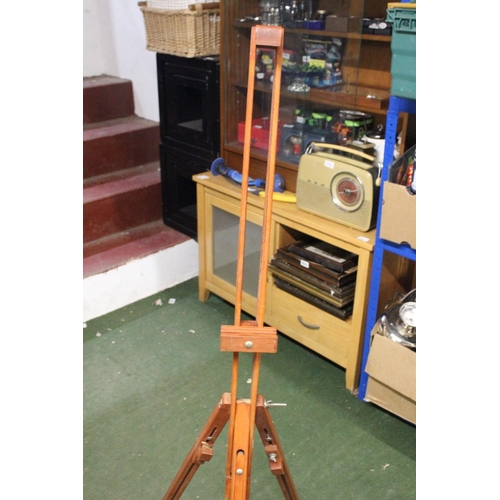 196 - A large wooden artists easel.