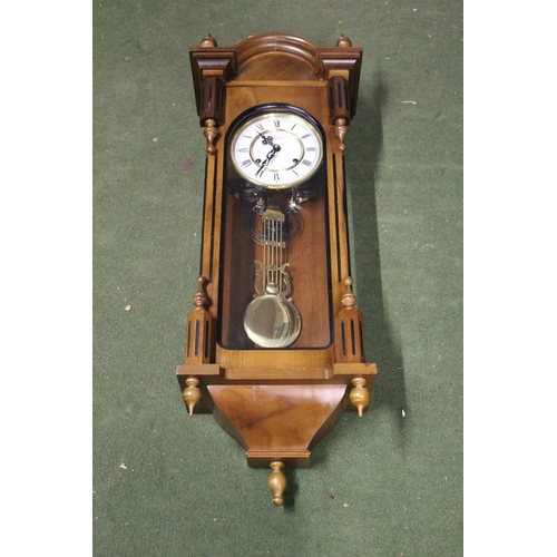 197 - A stunning Highlands wood cased Vienna wall clock.