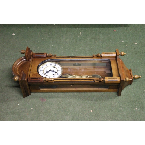 197 - A stunning Highlands wood cased Vienna wall clock.