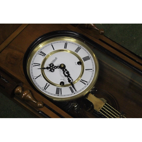 197 - A stunning Highlands wood cased Vienna wall clock.