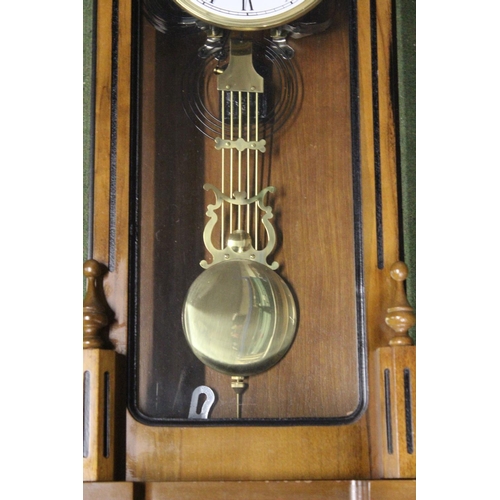 197 - A stunning Highlands wood cased Vienna wall clock.