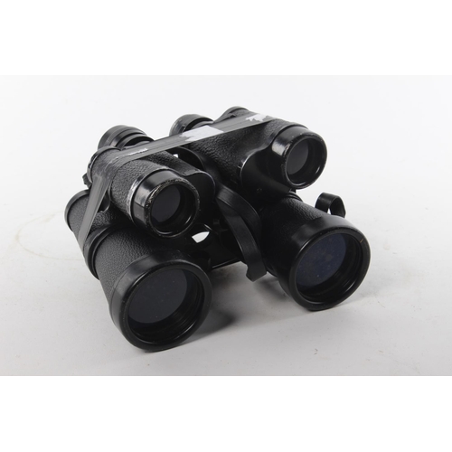 125 - A pair of Bushnell ensign binoculars and a pair of King binoculars (A/F).