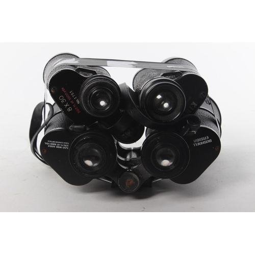 125 - A pair of Bushnell ensign binoculars and a pair of King binoculars (A/F).