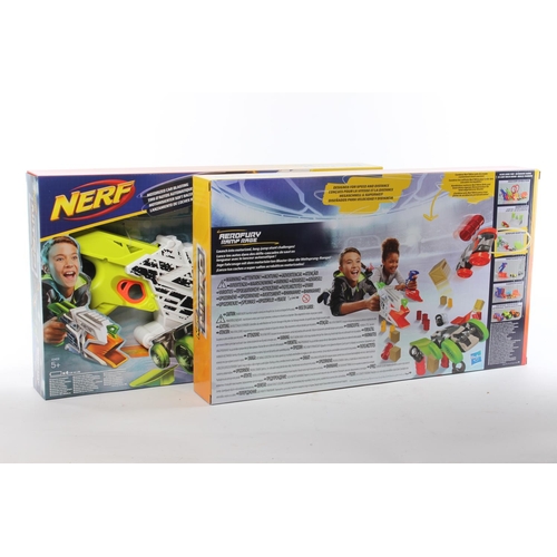 204 - Two ex shop stock Nerf Nitro toy guns.