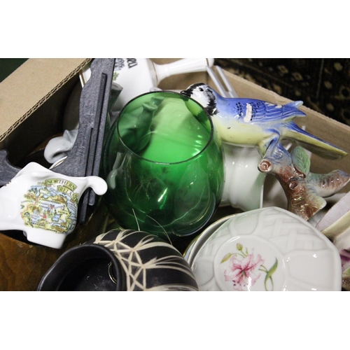 206 - An assortment of items to include ceramics, glassware and more.