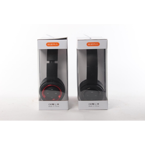 208 - Two pairs of Ezra Bluetooth headphones.