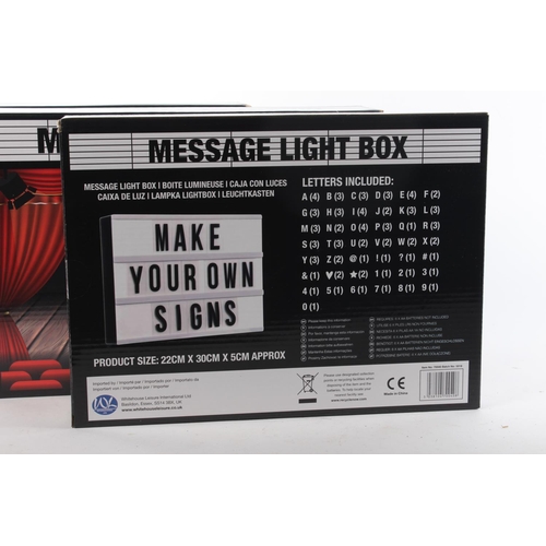 215 - Three boxed message light boxes.