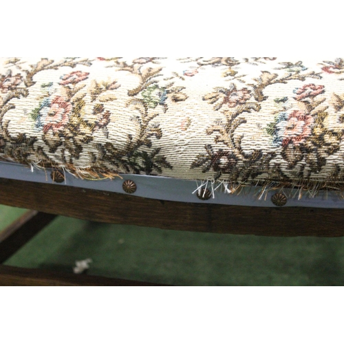 216 - A vintage chair with decorative woven back.