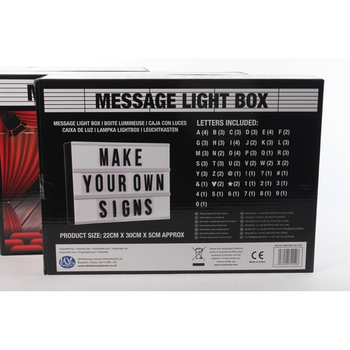 219 - Three boxed message light boxes.