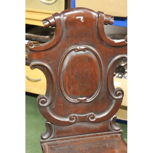 226 - A stunning antique shield back hall chair.