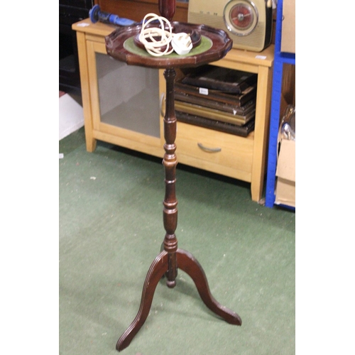 227 - A wine table with green leather top and table lamp.