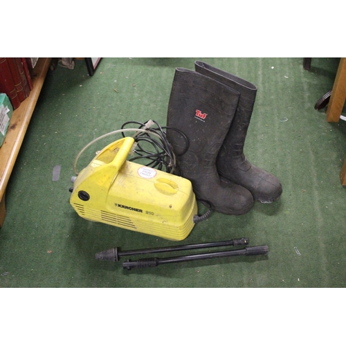 234 - A power washer and a pair of wellington boots.