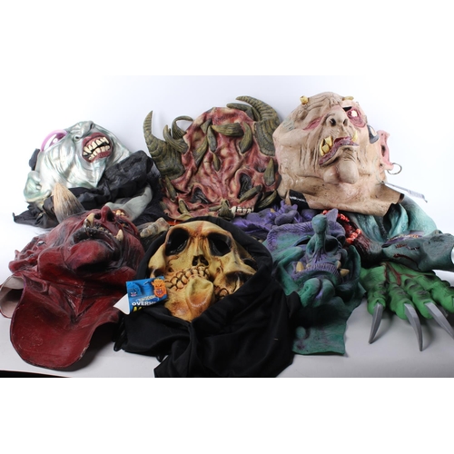 235 - An assortment of Halloween masks and accessories.