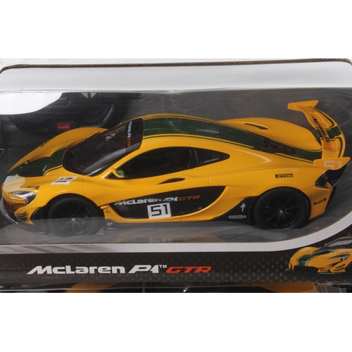 249 - 2 boxed remote control McLaren P1 GTR cars.