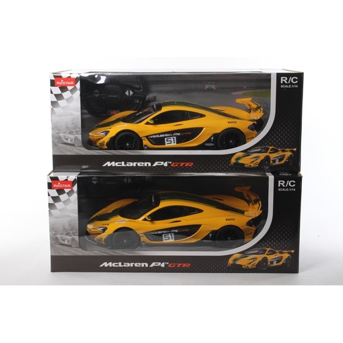 257 - 2 boxed remote control McLaren P1 GTR cars.