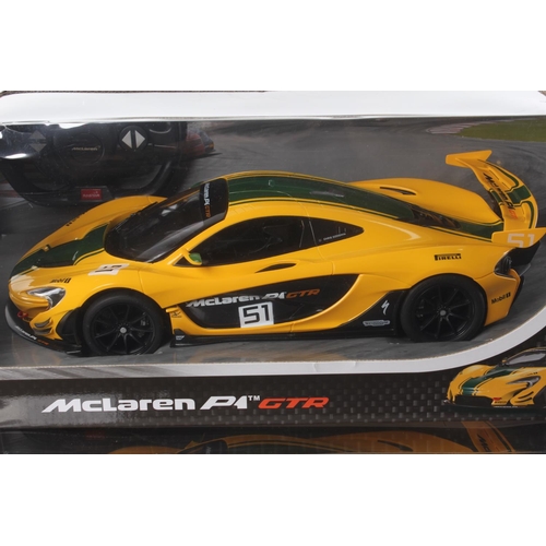 257 - 2 boxed remote control McLaren P1 GTR cars.