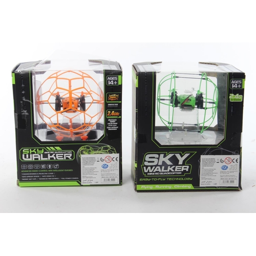 275 - 2 boxed remote control Sky Walkers.