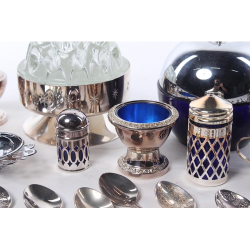 287 - An assortment of silver plated items.