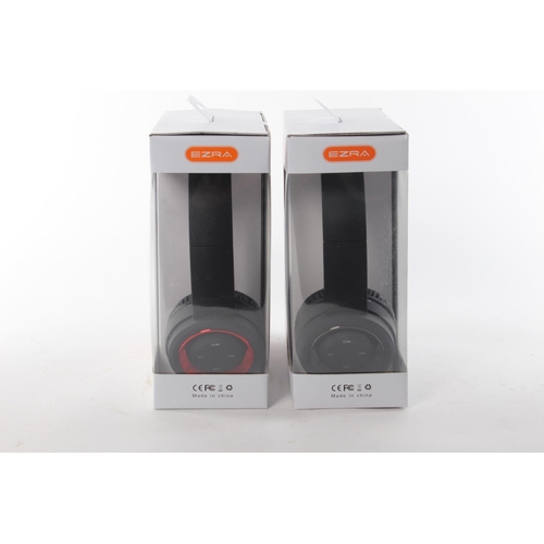 299 - Two pairs of Ezra Bluetooth headphones.