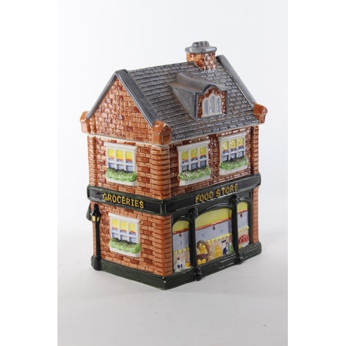 329 - A cookie jar modelled as a building.