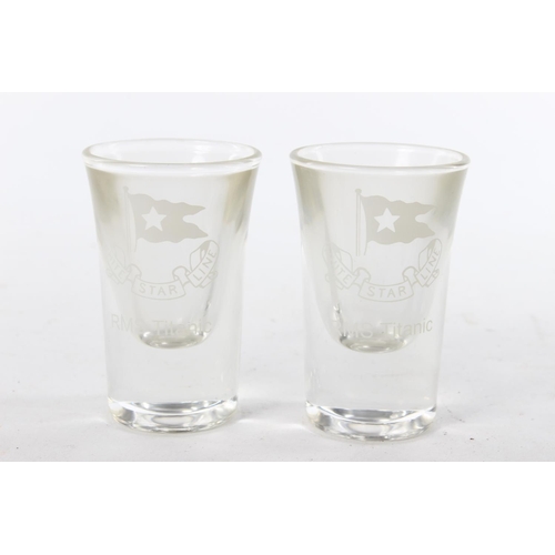 335 - A pair of souvenir White Star Line shot glasses.