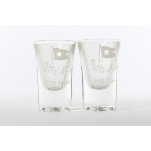 335 - A pair of souvenir White Star Line shot glasses.