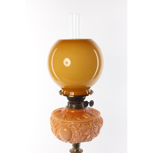 338 - A stunning antique oil lamp with coloured glass bowl & shade.