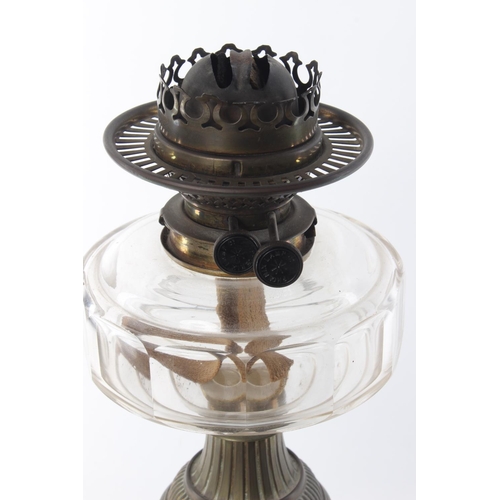 339 - An antique oil lamp with clear glass bowl.